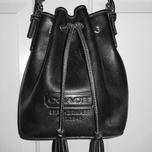 My purse closet over floweth with designer purses.